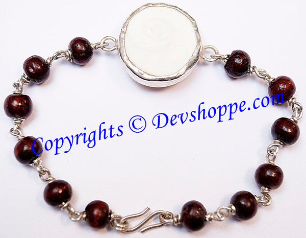 Gomti Chakra bracelet with Red Sandalwood beads in pure silver Gomti Chakra bracelet with Red Sandalwood beads in pure silver