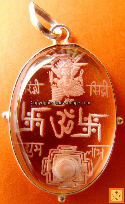'Riddhi Siddhi Ganesha with Sriyantra' hand carved crystal pendant in white metal