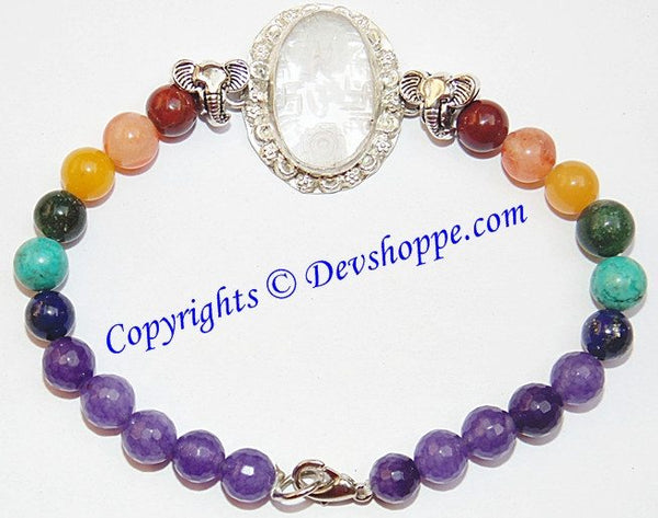 Sri Ganesha, Ridhi , Sidhi ,Sriyantra (Sri yantra) carved on Sphatik (Crystal) stone with Chakra beads bracelet Sri Ganesha, Ridhi , Sidhi ,Sriyantra (Sri yantra) carved on Sphatik (Crystal) stone with Chakra beads bracelet