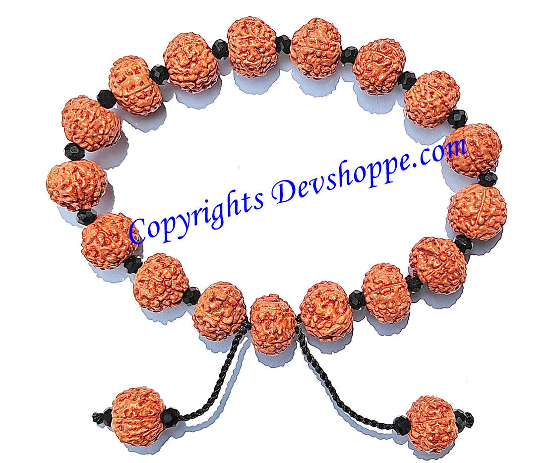 Rudraksha 7 mukhi bracelet with glass spacers, multiple orange beads with black spacer details