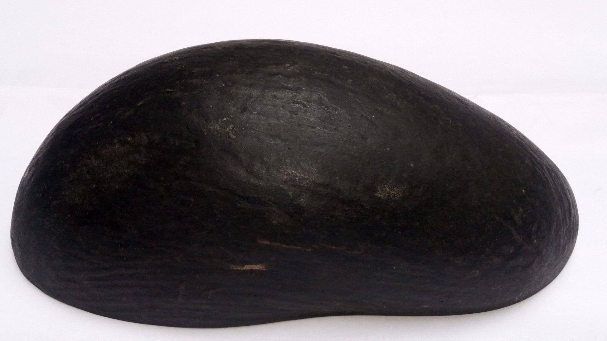 Dark coco de mer khappar, domed top with uneven, natural finish