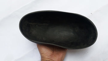 Dark coco de mer khappar, oval bowl shape with smooth interior surface