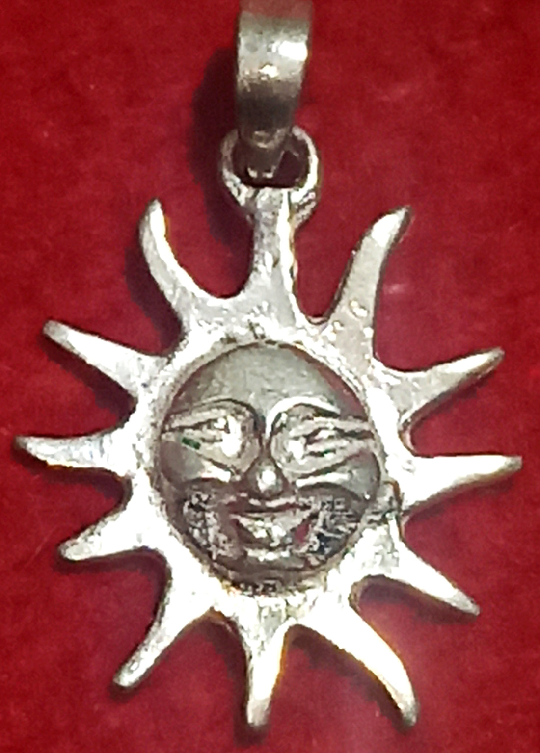Pure Silver Sun pendant with detailed face and faceted rays, round center