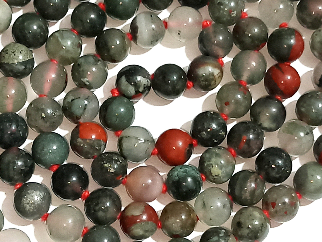 Bloodstone mala with dark green and red beads and red tassel