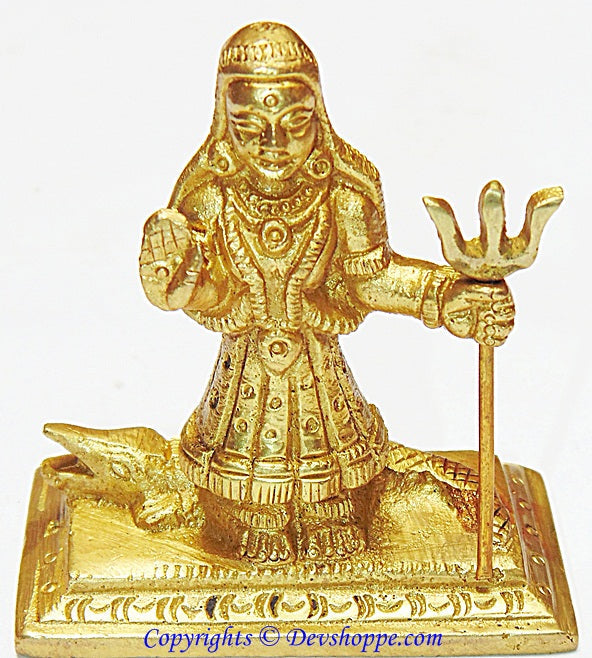 Khodiyar maa idol in brass with raised right hand and ornate jewelry, holding staff