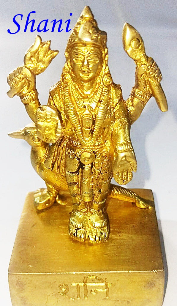 Navagraha idol, gold-tone deity figurine with raised arms on rectangular base