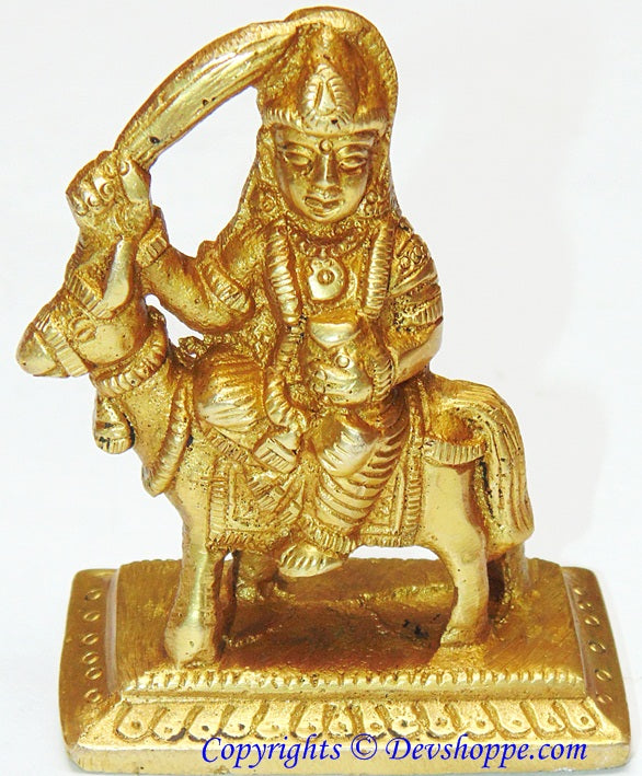 Shitala mata brass idol, seated figure with raised arm and detailed jewelry
