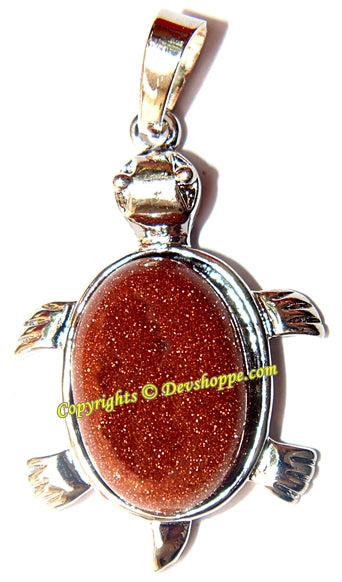 Sunstone turtle pendant in white metal, oval red glitter cabochon centerpiece