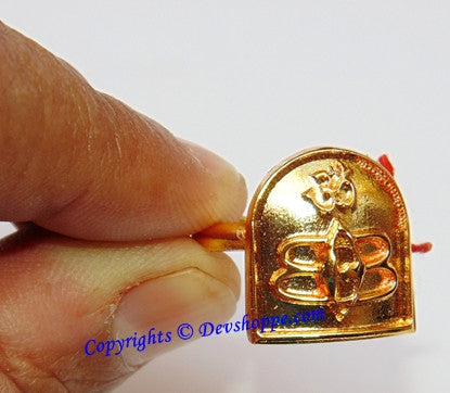 Brass ring band with raised Shiva face and third-eye symbol