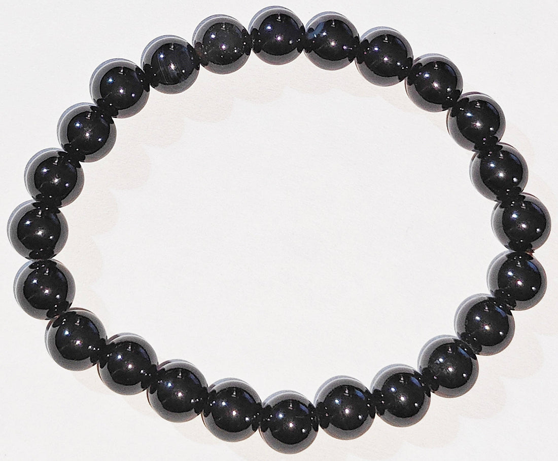 Black agate power bracelet with round dark beads