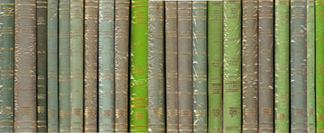 Skanda Purana: set of 23 volumes, multi-colored book spines in a row