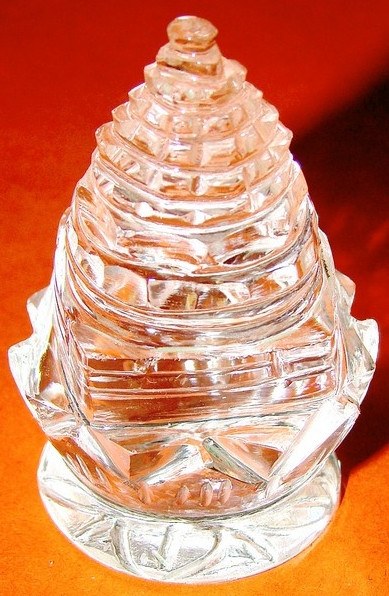 Clear crystal Shree yantra with lotus base, shaped pyramid