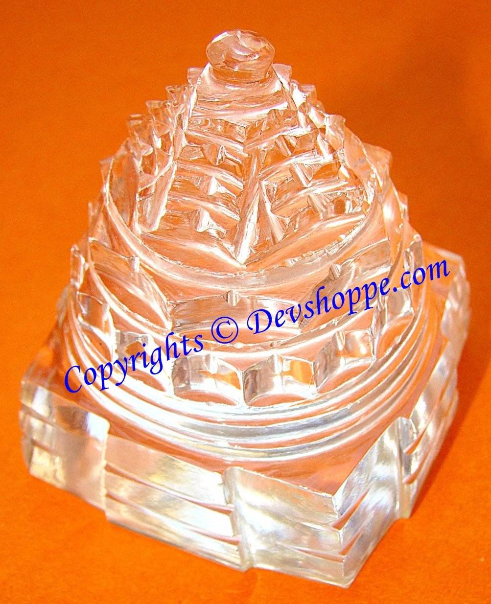 Crystal Sri yantra in clear crystal, stepped design with round top and base