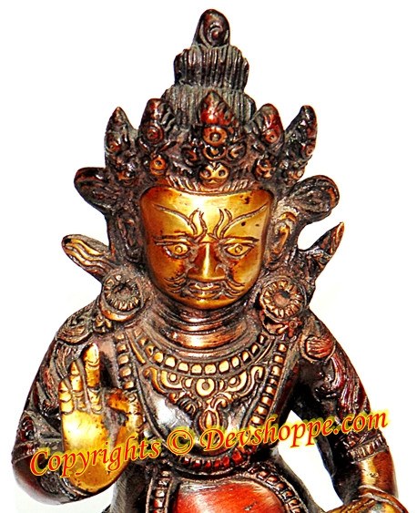 Lord Kubera hand-painted brass idol, seated multi-armed figure with gold details