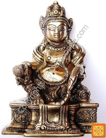 Lord Kubera idol in mixed metal alloy with seated deity, ornate crown and jewelry