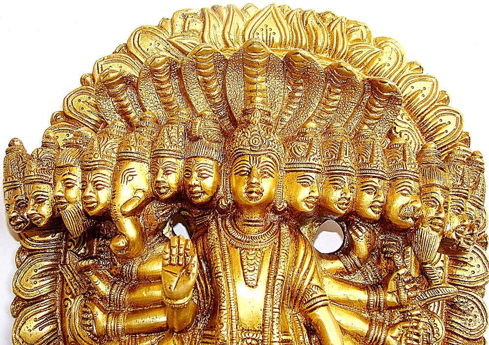 Brass Lord Vishnu Virat Swaroop statue, seated with ornate halo of faces