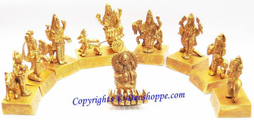 Brass Navagraha idol set with nine planet figures on individual bases, centered