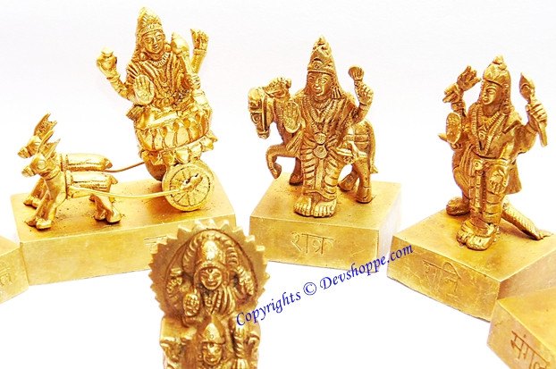 Brass Navagraha idols, three seated figures with wheel and standing poses on bases
