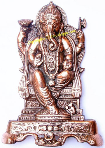 Ganesha sitting wall hanging statue, ornate bronze-tone design with raised trunk