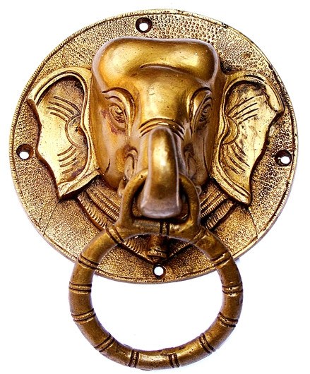 Ganesha face door knocker in antique bronze with round backplate