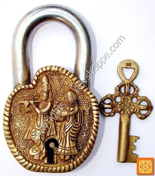 Sri Radha Krishna temple lock with ornate golden deity design and matching key