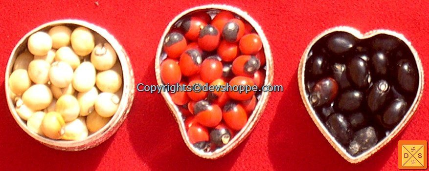 Set of chirmi beads in silver boxes: round yellow, teardrop red, heart dark beads