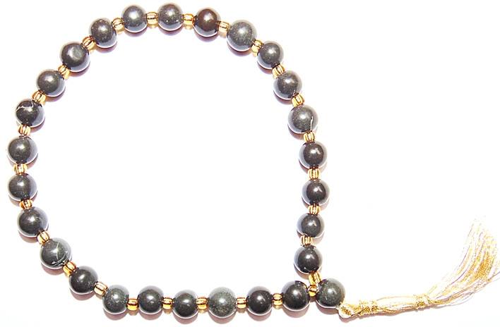 Black Hakik wrist mala bracelet with gold spacers and small tassel