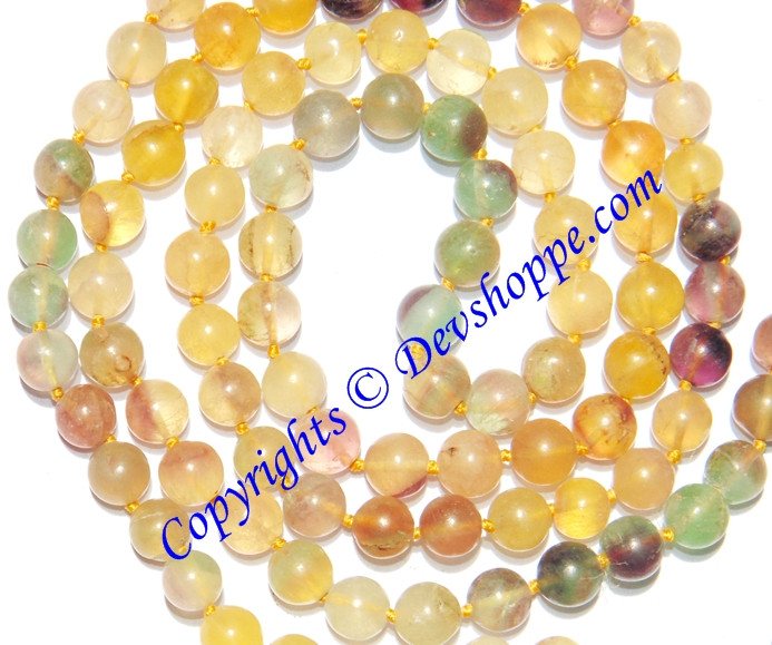 Fluorite mala: round yellow-green beads with gold tassel