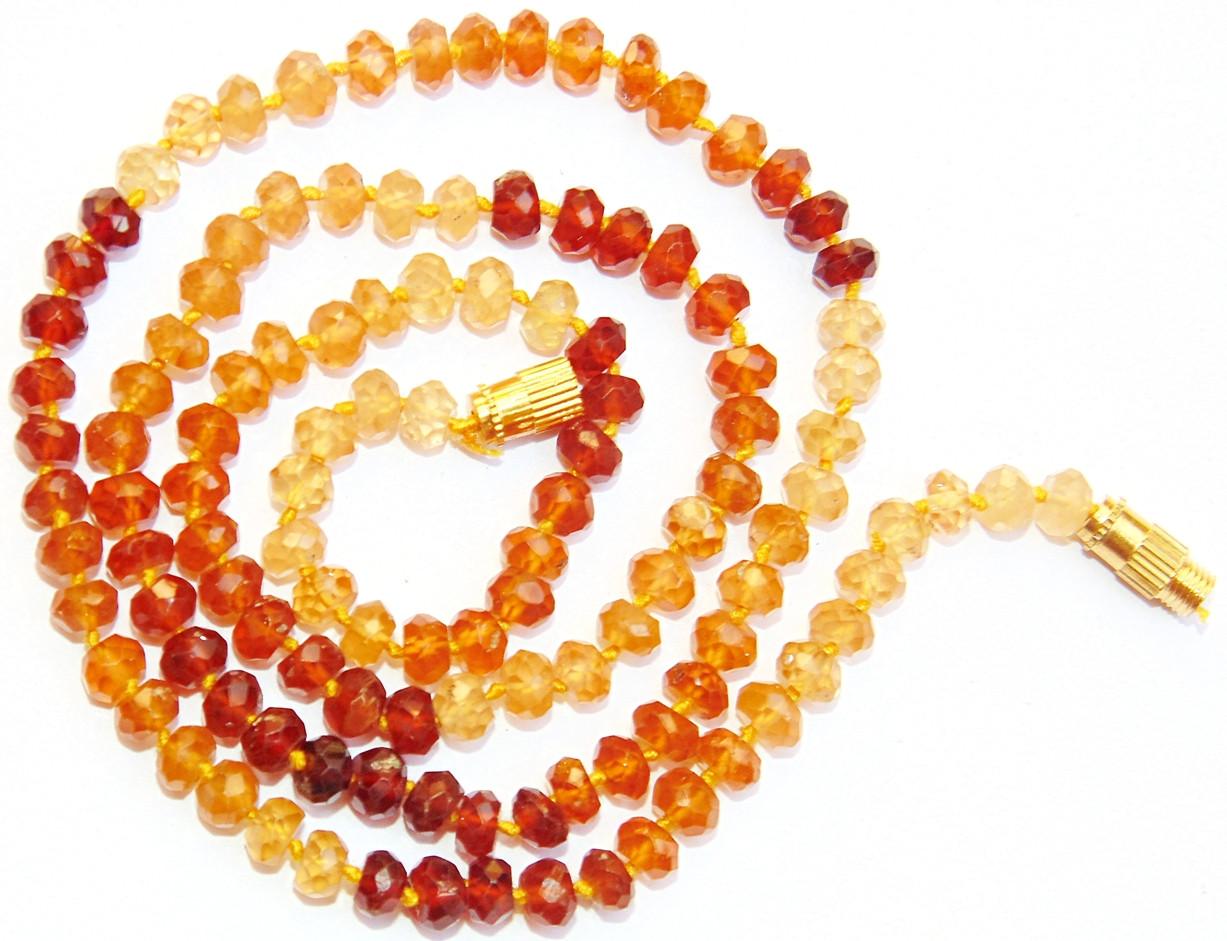 Mala aus gelb-orangen und rotbraunen facettierten Perlen, goldfarbenes Zwischenstück