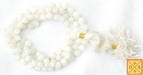 Moonstone mala with white round beads and white tassel with small gold accents