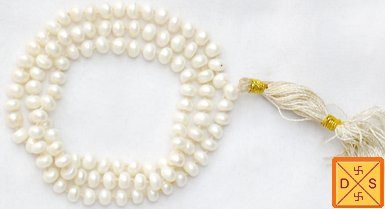 White pearl mala with round beads and light gold tassel with braided cord