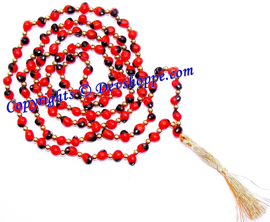Red and black bead mala with gold accents and tassel charm cord