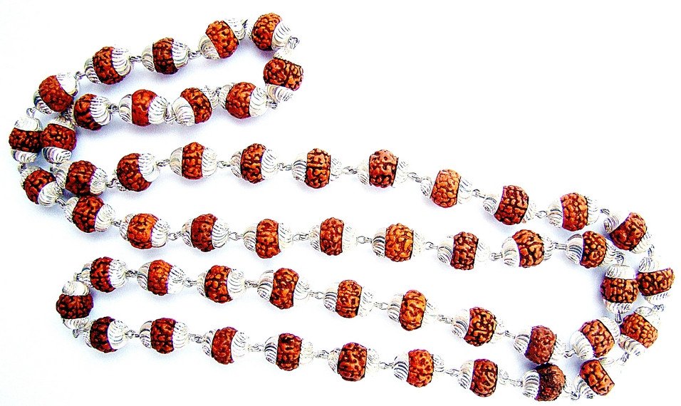7 mm Rudraksha mala: red beads with silver spacers, long strand of 55 beads