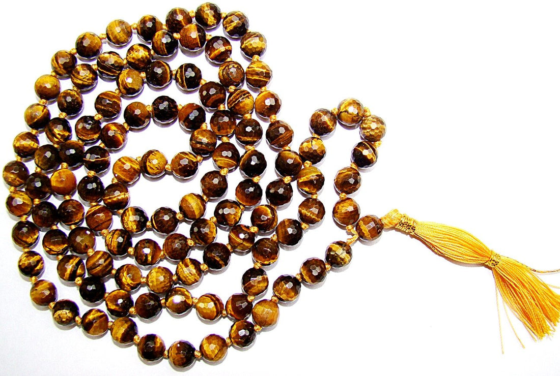 Tiger eye mala with faceted beads and yellow tassel