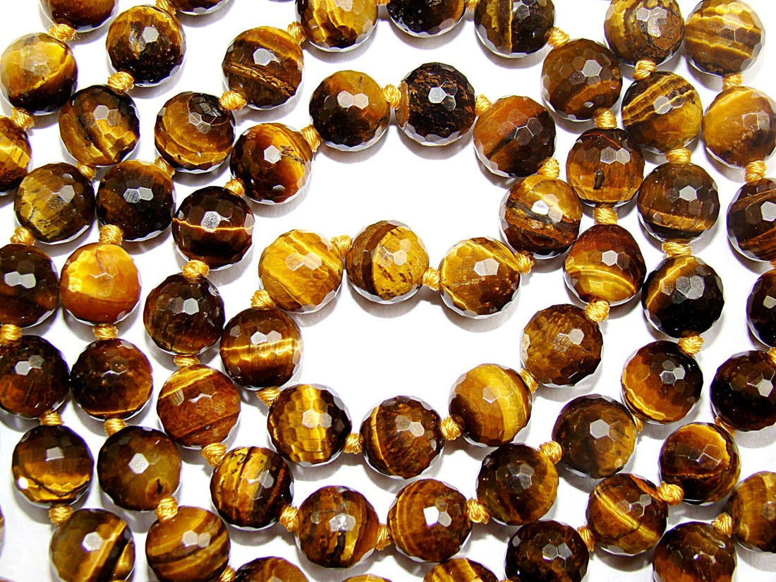 Tiger eye mala with faceted beads and yellow tassel