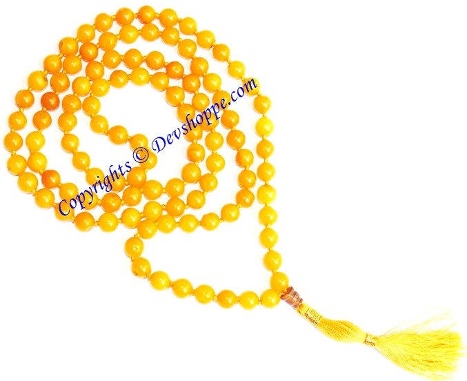 Yellow jade mala with round beads and tassel end