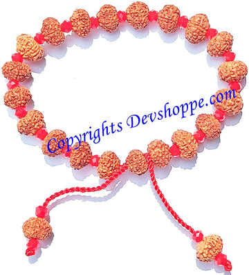 9 Mukhi Java Rudraksha bracelet with orange seed beads, red spacers, tassel strings