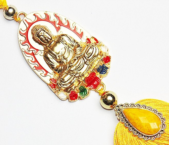 Buddha pendant with yellow tassel and teardrop amber resin stone plus bead accents