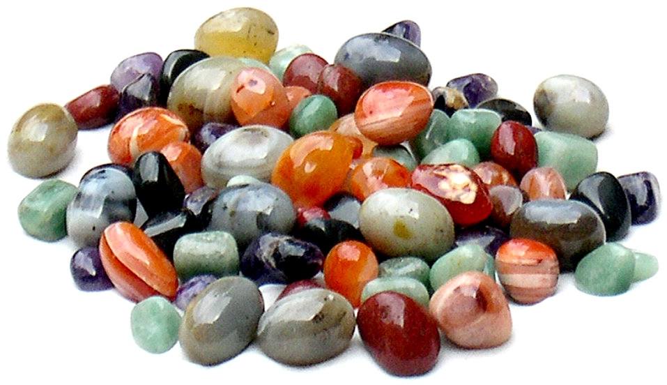 Natural multi-color quartz pebbles, oval stones in assorted greens, reds, oranges, and grays
