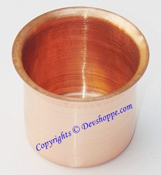 Small copper Panchapatra bowl with smooth cylindrical shape and reddish interior