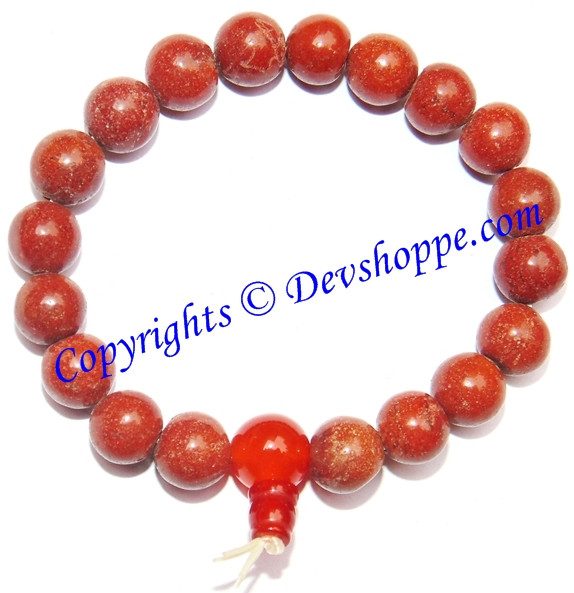 Red jasper bead power bracelet with round red stones and tied cord end