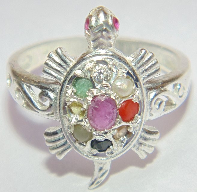 Silver tortoise-shaped ring, flower-like oval center with pink, red, green and black stones