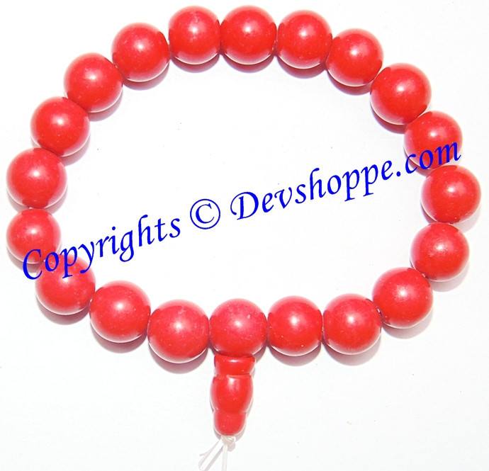 Taiwanese Coral Power bracelet: red round coral-bead stretch bracelet with charm