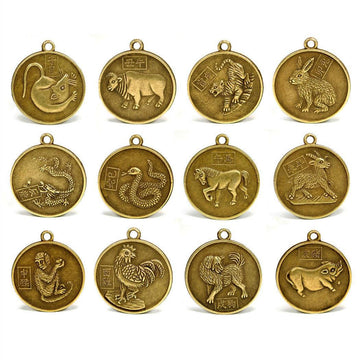 Set of 12 Chinese zodiac coins, gold-toned round charms with hanging loops and animals