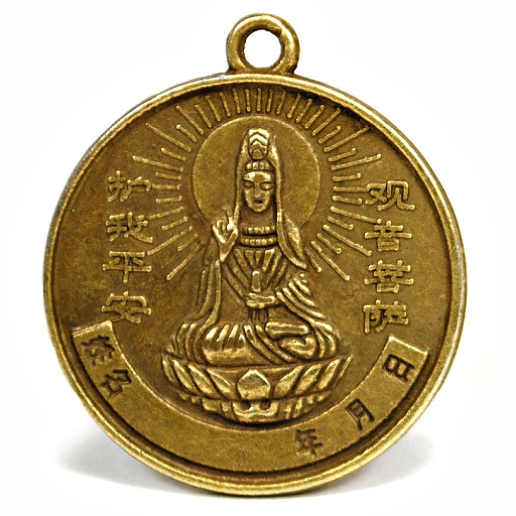 Gold round charm coin with hanging loop, seated figure and Chinese characters