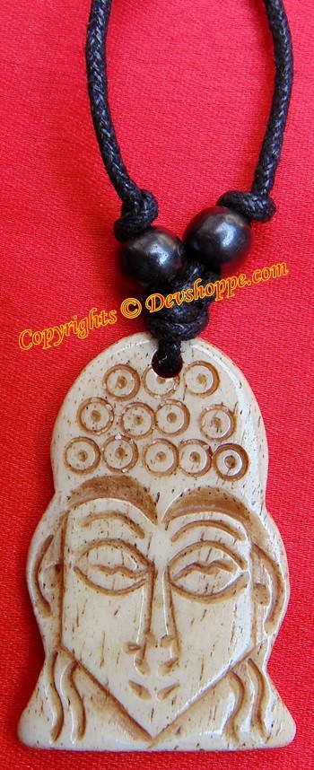 Buddha pendant with carved face and cord, dark beads and light stone finish