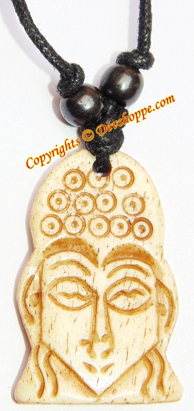 Close-up Buddha pendant on black cord with round dark beads and circular designs