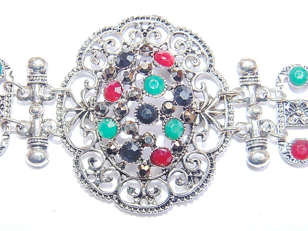 German silver tribal charm bracelet with round red, green, and dark stones