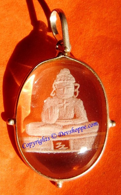 Lord Mahavir crystal pendant with oval bezel and engraved figure