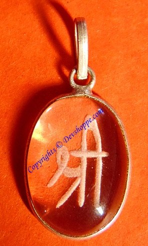 Oval crystal pendant with Shree/Sacred Hindu symbol, clear faceted edge and bail loop.